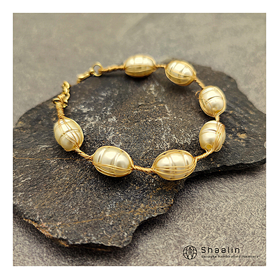 Elegant Pearl Studded Gold Plated Bracelet