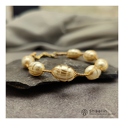 Elegant Pearl Studded Gold Plated Bracelet